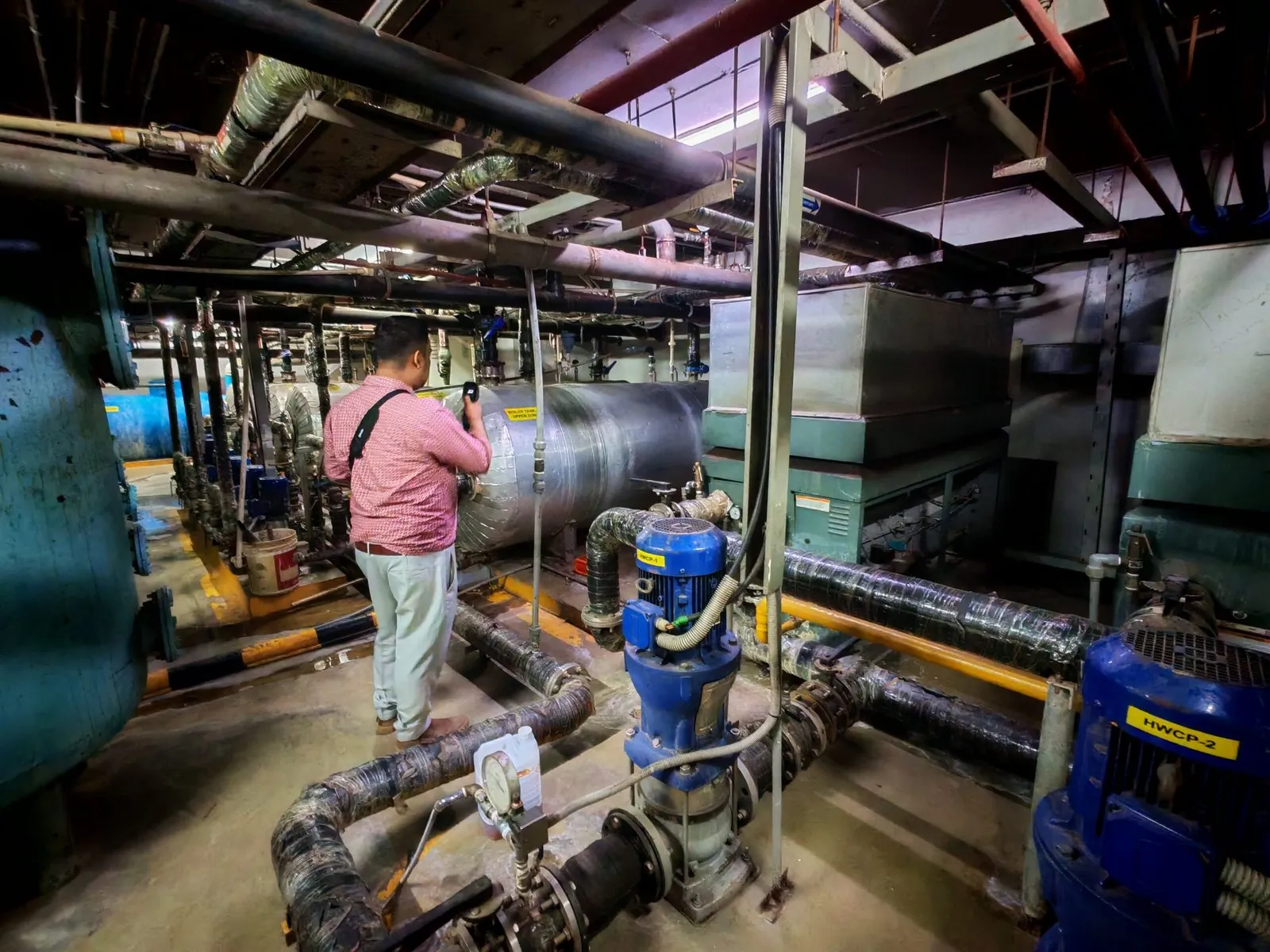 Utility pump room with insulated pipes and gas line